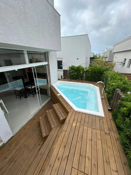 Casa em Condomínio com 3 suítes em Capão da Canoa.: 2ª foto da galeria de imagens do imóvel