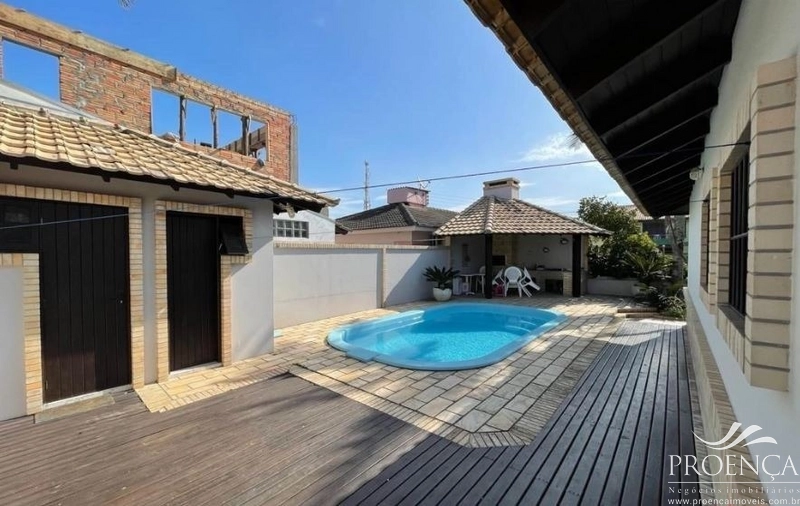 Casa 4 dormitórios, com piscina em Xangri-lá: 3ª foto da galeria de imagens do imóvel