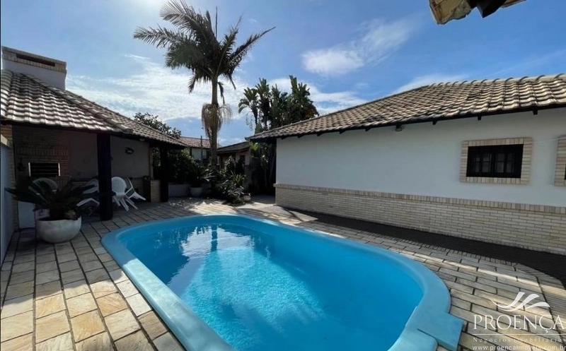 Casa 4 dormitórios, com piscina em Xangri-lá: 2ª foto da galeria de imagens do imóvel