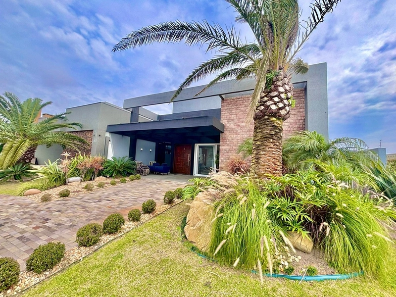 Casa térrea 4 dormitórios/2 suítes - Cond Capão Ilhas -Capão da Canoa: 2ª foto da galeria de imagens do imóvel