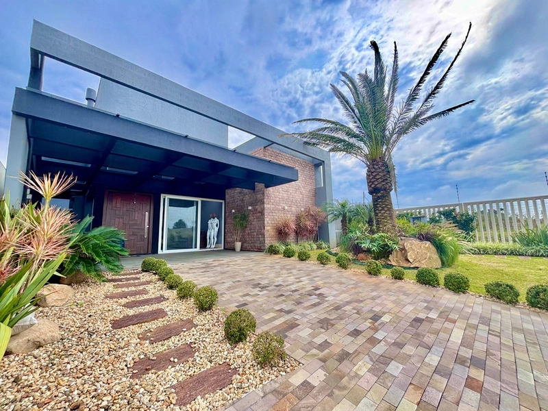 Casa térrea 4 dormitórios/2 suítes - Cond Capão Ilhas -Capão da Canoa