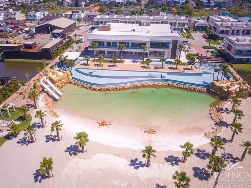 Casa em condomínio fechado alto padrão em Capão da canoa: 5ª foto da galeria de imagens do imóvel