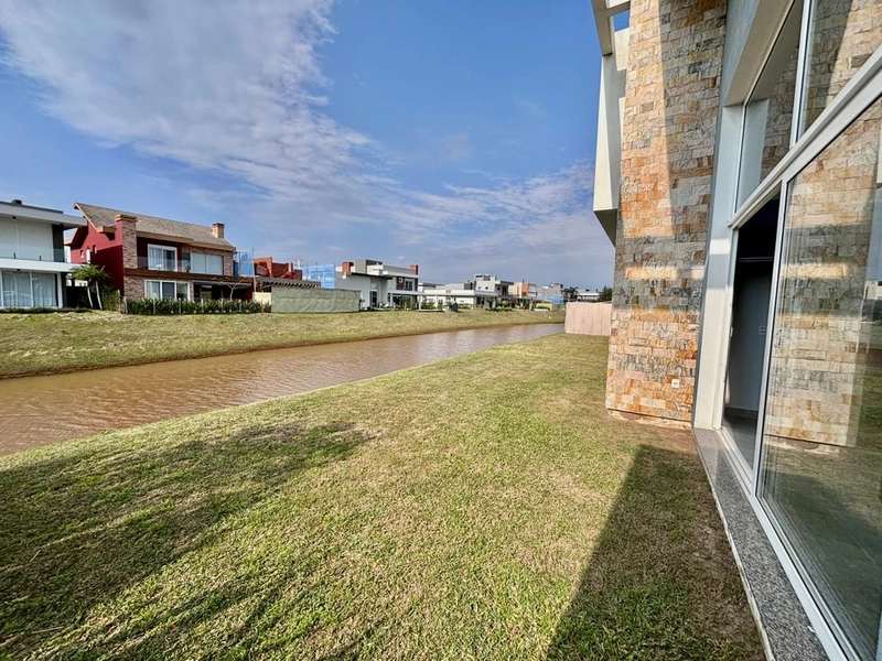 Casa Térrea 4 suítes beira lago-Cond Capão Ilhas Resort-Capão da Canoa: 13ª foto da galeria de imagens do imóvel