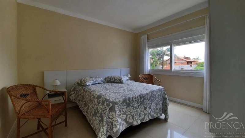 Casa e Sobrado em XANGRI-LÁ com 5 suítes e 300 m²: 24ª foto da galeria de imagens do imóvel