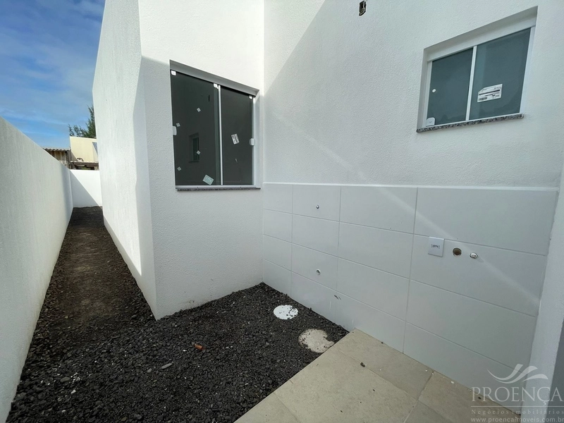 Casa de dois dormitórios, pátio na frente e fundos, Capão da Canoas.: 11ª foto da galeria de imagens do imóvel