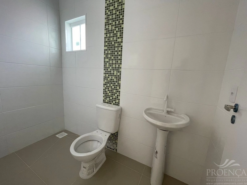 Casa de dois dormitórios, pátio na frente e fundos, Capão da Canoas.: 9ª foto da galeria de imagens do imóvel