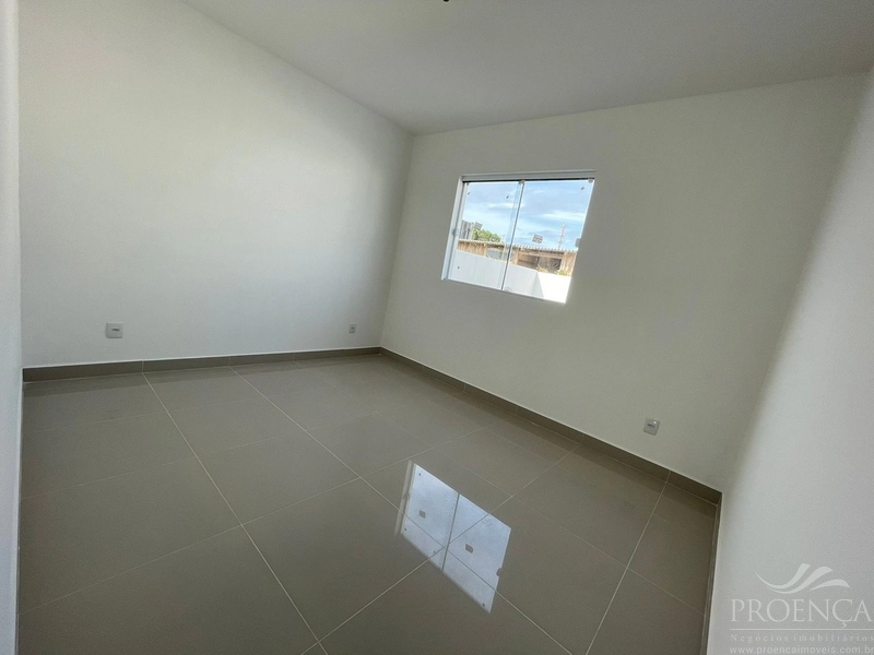 Casa de dois dormitórios, pátio na frente e fundos, Capão da Canoas.: 8ª foto da galeria de imagens do imóvel
