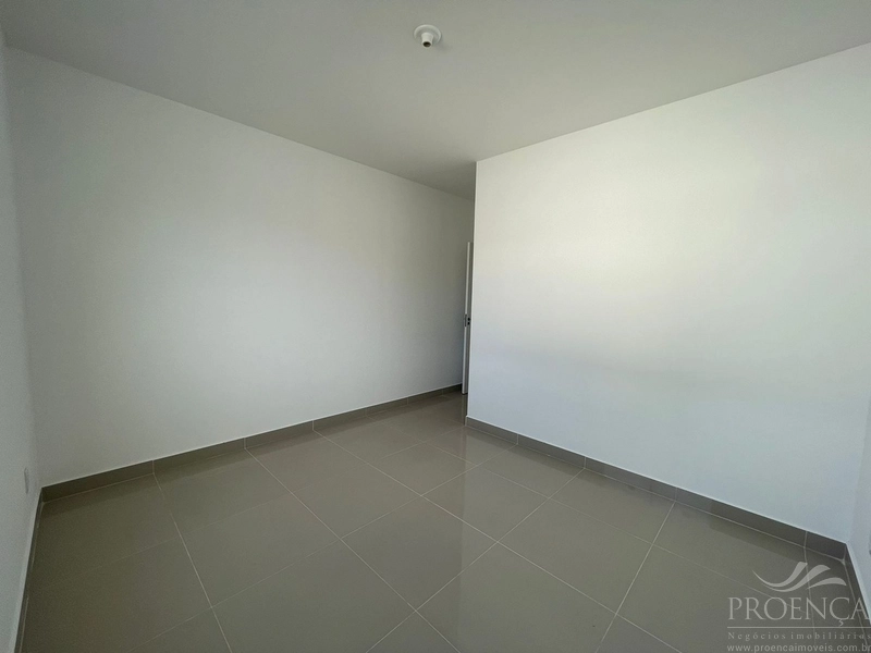 Casa de dois dormitórios, pátio na frente e fundos, Capão da Canoas.: 10ª foto da galeria de imagens do imóvel