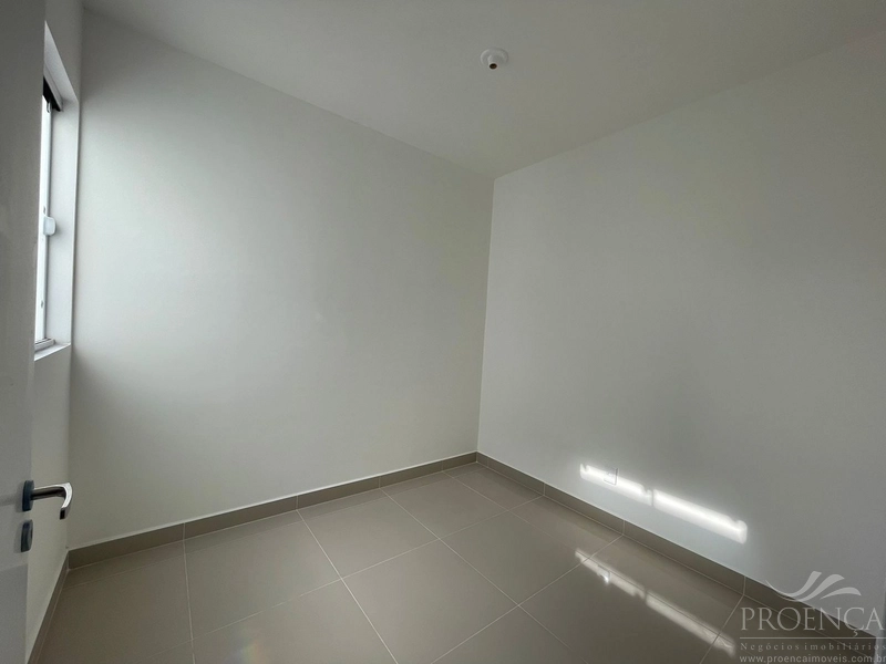 Casa de dois dormitórios, pátio na frente e fundos, Capão da Canoas.: 6ª foto da galeria de imagens do imóvel