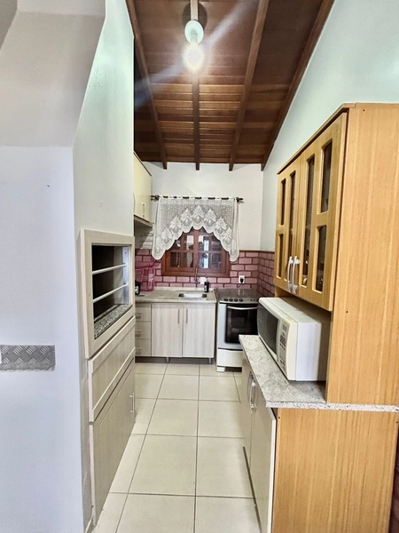 Casa 4 dormitórios com piscina no Centro de Xangri-lá: 7ª foto da galeria de imagens do imóvel