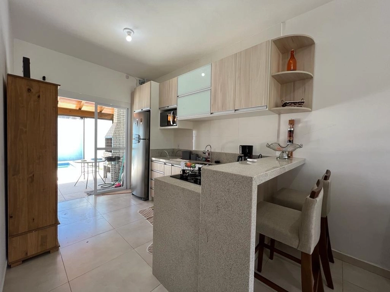Casa 02 dormitórios com piscina aquecida.: 5ª foto da galeria de imagens do imóvel
