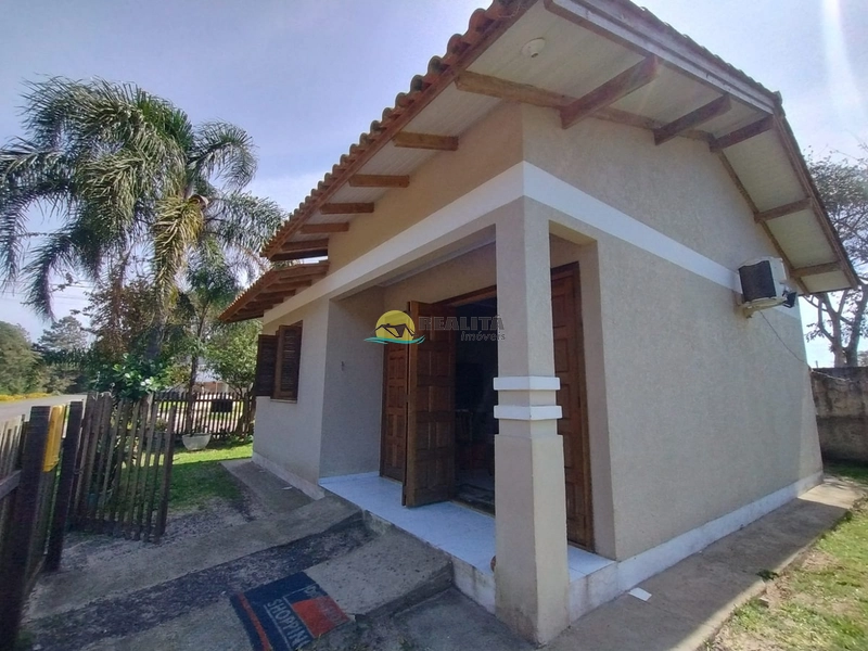 Casa em capão novo village, loteamento aberto e infraestrutura: 1ª foto da galeria de imagens do imóvel
