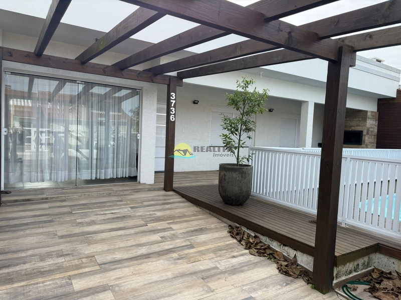 Casa de 3 dormitórios em localização nobre em capão novo.: 1ª foto da galeria de imagens do imóvel
