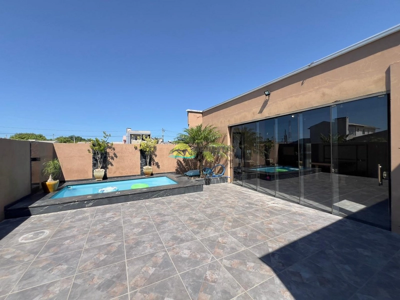 Casa 3 Dormitórios com Suíte | 120m² | Jardim com Piscina e Pergolado: 24ª foto da galeria de imagens do imóvel