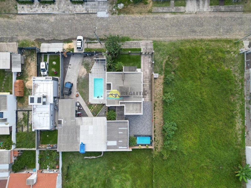 Casa 3 Dormitórios com Suíte | 120m² | Jardim com Piscina e Pergolado: 27ª foto da galeria de imagens do imóvel