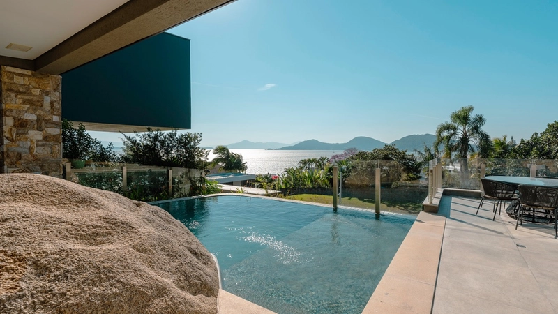 Casa com 4 suítes e vista mar permanente no Cacupé: 3ª foto da galeria de imagens do imóvel