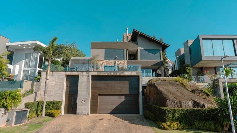 Casa com 4 suítes e vista mar permanente no Cacupé: 1ª foto da galeria de imagens do imóvel
