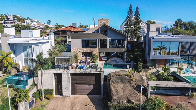 Casa com 4 suítes e vista mar permanente no Cacupé: 2ª foto da galeria de imagens do imóvel