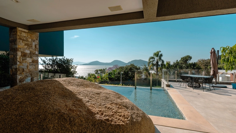 Casa com 4 suítes e vista mar permanente no Cacupé: 4ª foto da galeria de imagens do imóvel