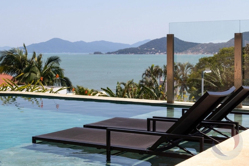Casa com 4 suítes e vista mar permanente no Cacupé: 1ª foto da galeria de imagens do imóvel