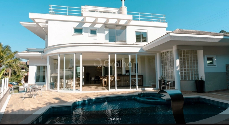 CASA EM CONDOMINIO FECHADO NO CACUPÉ: 2ª foto da galeria de imagens do imóvel