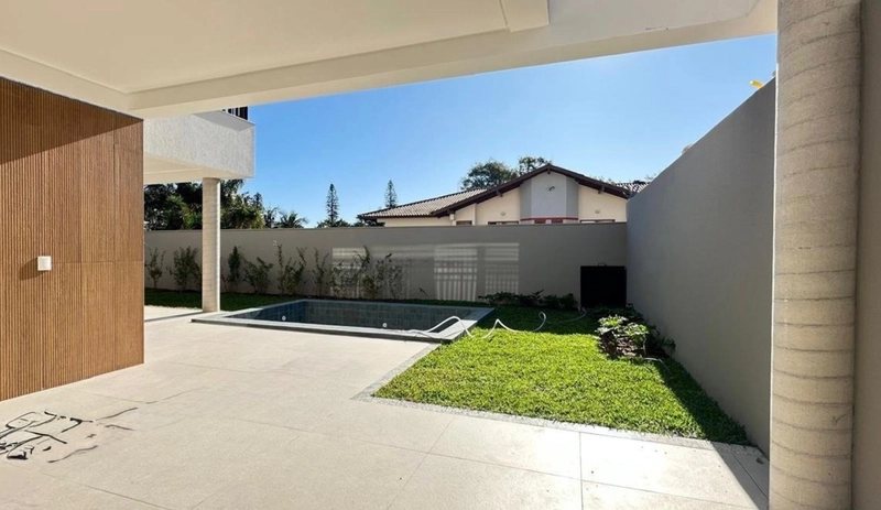 CASA COM 4 SUITES NO ALAMEDA CACUPE: 2ª foto da galeria de imagens do imóvel