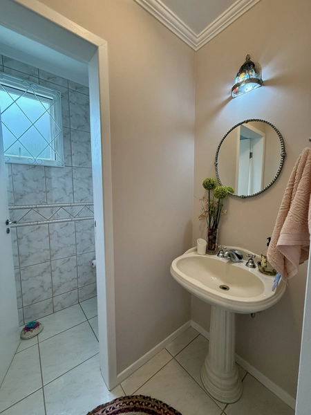 Casa de 295m² com 3 suítes em Cacupé em condomínio fechado: 14ª foto da galeria de imagens do imóvel