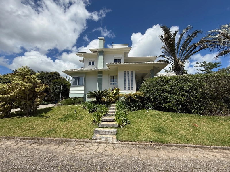 Casa de 295m² com 3 suítes em Cacupé em condomínio fechado: 35ª foto da galeria de imagens do imóvel