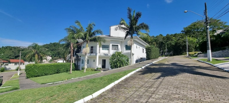 Casa com 4 suítes no Condomínio Casa Blanca no Cacupé: 1ª foto da galeria de imagens do imóvel