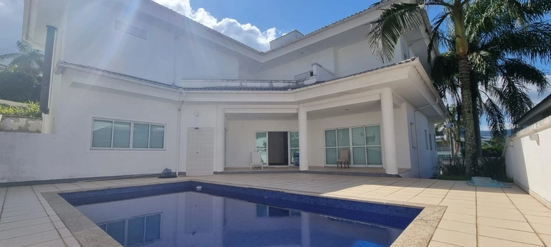 Casa com 4 suítes no Condomínio Casa Blanca no Cacupé: 3ª foto da galeria de imagens do imóvel