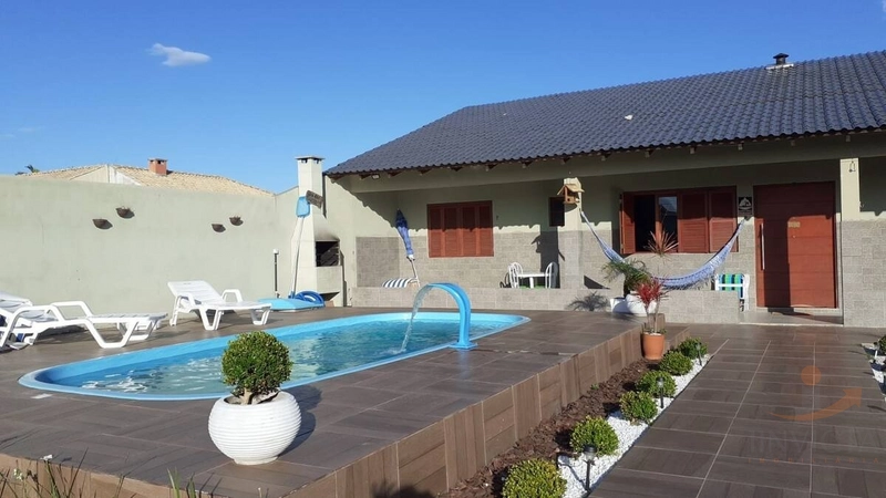 Casa Com Piscina na Zona Nova - Capão da Canoa - .: 1ª foto da galeria de imagens do imóvel