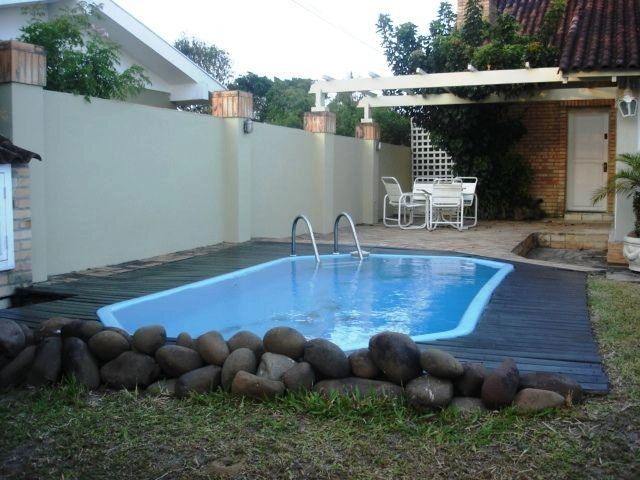 Casa com piscina em Atlântida: 1ª foto da galeria de imagens do imóvel