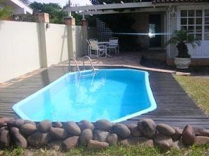 Casa com piscina em Atlântida: 24ª foto da galeria de imagens do imóvel