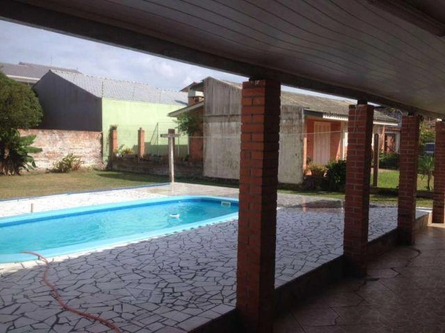 Casa com piscina Capão da Canoa: 1ª foto da galeria de imagens do imóvel