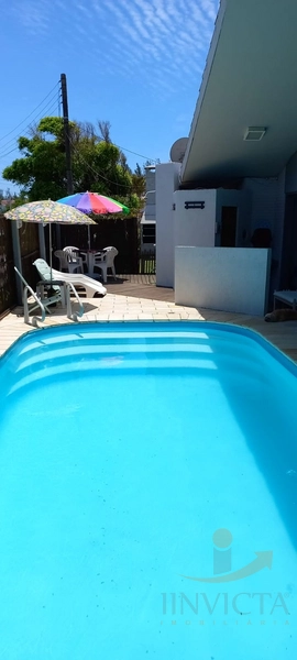 Casa 4 dormitórios com piscina em Xangri-lá: 19ª foto da galeria de imagens do imóvel