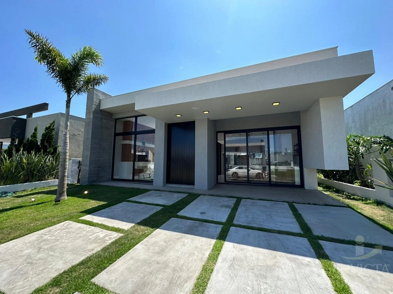 Casa em Condomínio - 4 suítes - Capão da Canoa: 1ª foto da galeria de imagens do imóvel