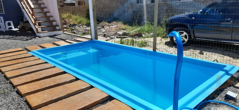 Casa com 4 dormitórios e PISCINA: 6ª foto da galeria de imagens do imóvel