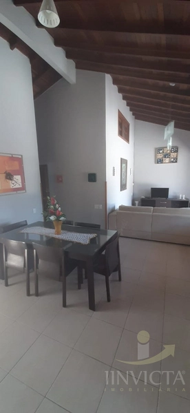Casa de 4 dormitórios com piscina em Xangri-lá: 2ª foto da galeria de imagens do imóvel