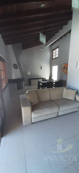 Casa de 4 dormitórios com piscina em Xangri-lá: 4ª foto da galeria de imagens do imóvel