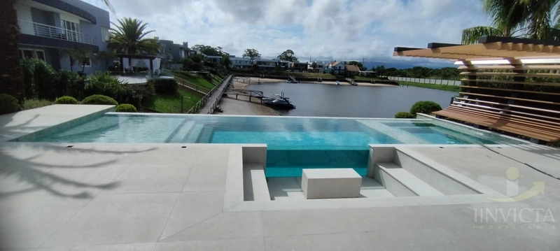 MANSÃO NO CONDOMINIO VELAS DA MARINA EM CAPAO DA CANOA /RS: 3ª foto da galeria de imagens do imóvel