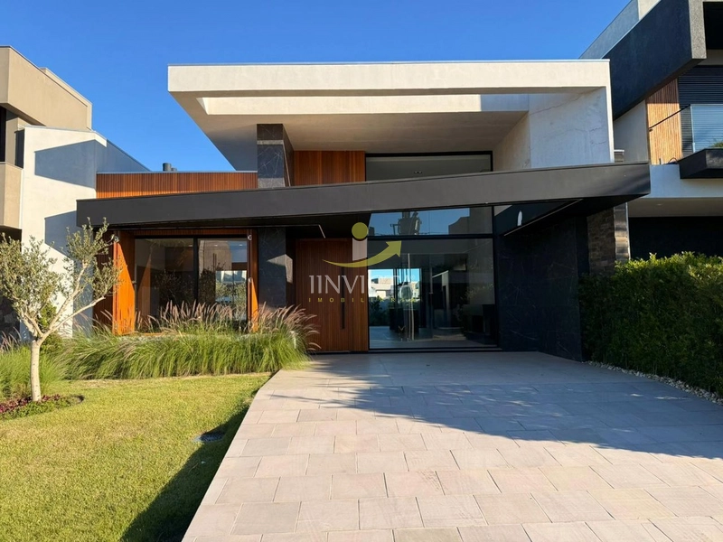 Casa com 4 suítes em condomínio fechado: 1ª foto da galeria de imagens do imóvel