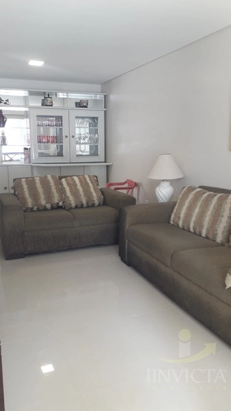 Belo apartamento térreo,3 dormitórios, uma quadra do mar e Praça: 12ª foto da galeria de imagens do imóvel