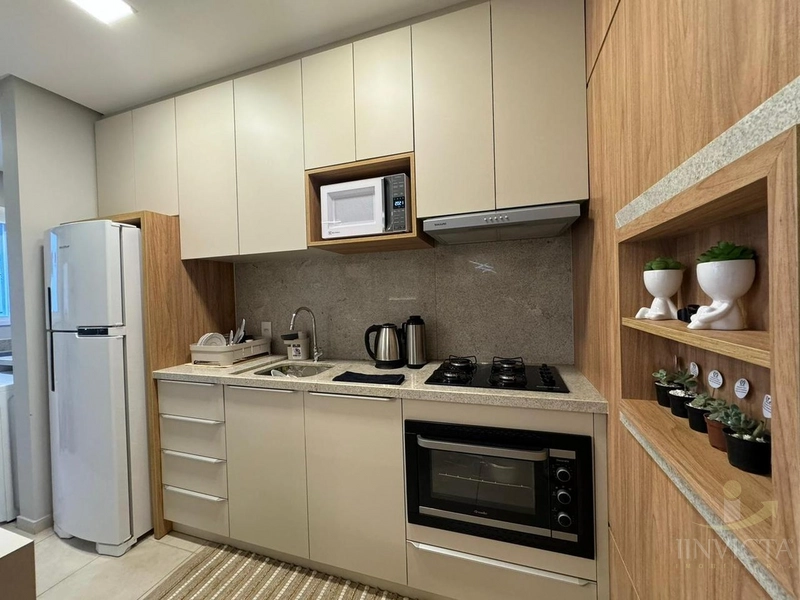 APARTAMENTO 1 DORM TOTALMENTE MOBILIADO E DECORADO A 200 M DO MAR: 8ª foto da galeria de imagens do imóvel