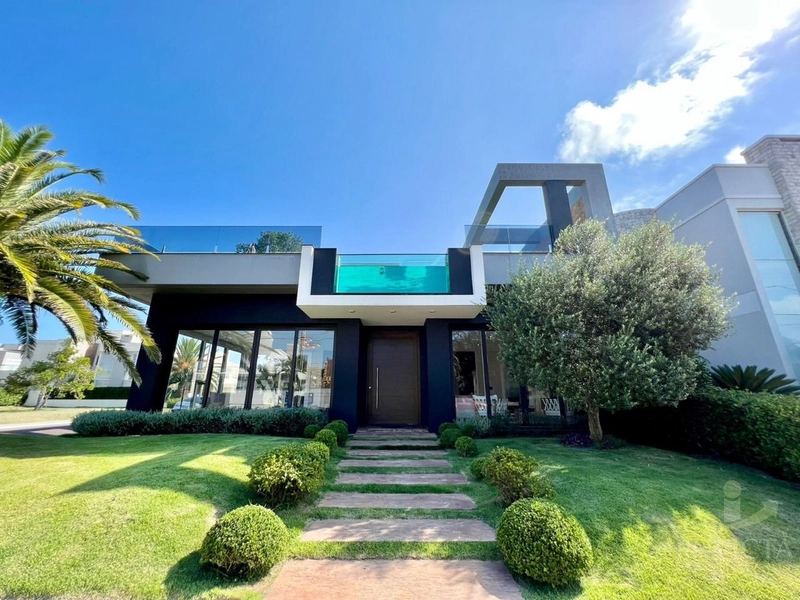 EXCELENTE CASA  COM 5 DORMITÓRIOS NO MELHOR CONDOMÍNIO!!!!: 1ª foto da galeria de imagens do imóvel