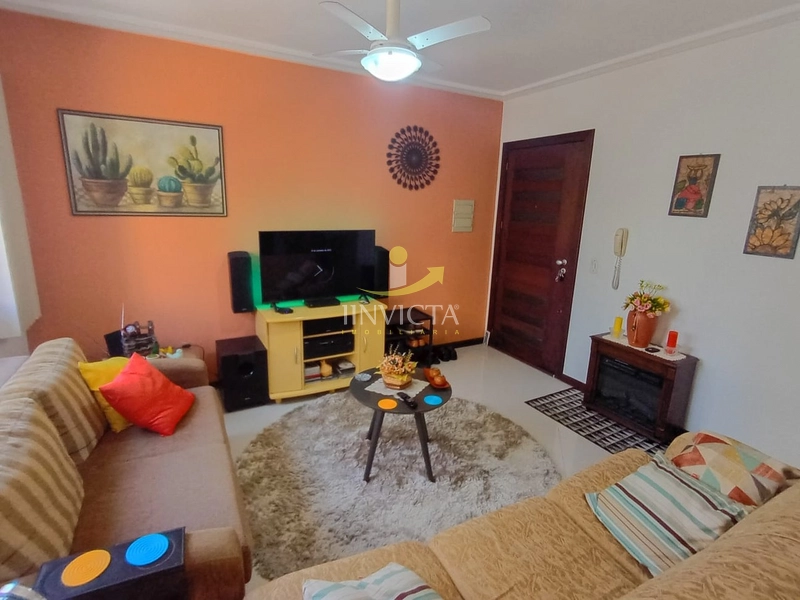 APARTAMENTO DE FRENTE APENAS UMA QUADRA DO MAR EM CAPÃO DA CANOA: 1ª foto da galeria de imagens do imóvel