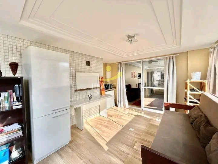 APARTAMENTO COM SACADA DE FRENTE PRÓXIMO AO MAR: 3ª foto da galeria de imagens do imóvel