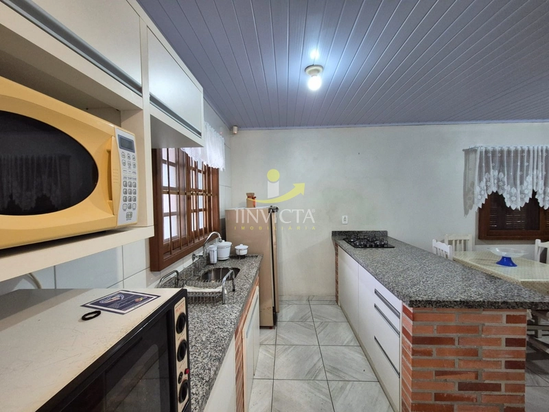 Casa térrea de esquina, 02 dormitórios com pátio cercado.: 9ª foto da galeria de imagens do imóvel
