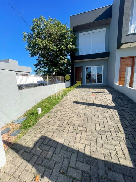 Seu novo lar está aqui! Sobrado com 3 dormitórios, 2 suítes e patio!: 1ª foto da galeria de imagens do imóvel