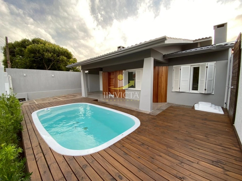 Casa elegante com piscina no centro de Xangri-Lá, mobiliada!: 9ª foto da galeria de imagens do imóvel