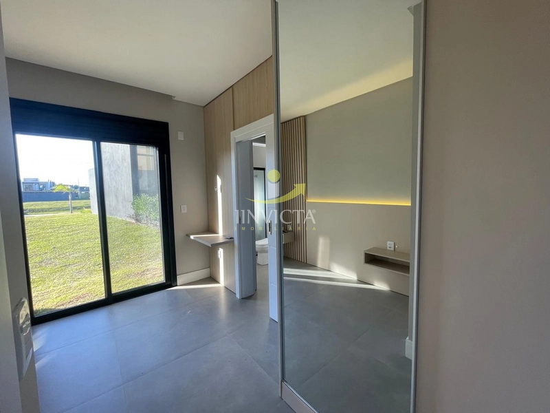 casa terrea com 4 suites em condominio fechado em Xangri-lá: 4ª foto da galeria de imagens do imóvel